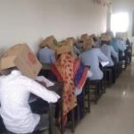 Alunos fazendo prova com caixa de papelão na cabeça para não colar na índia geram polêmica