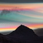 'Nuvens de arco-íris' ultra raras iluminam o Círculo Polar Ártico como auroras em novas fotos impres...