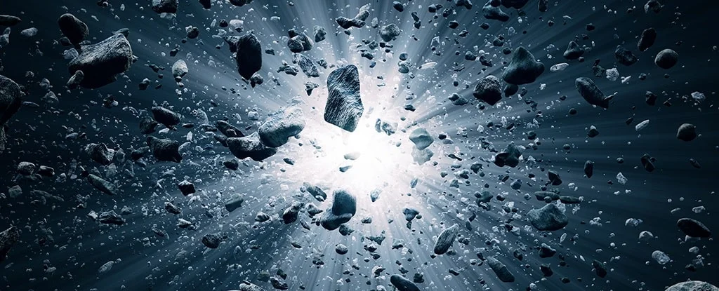 Explosão de uma rocha no espaço.